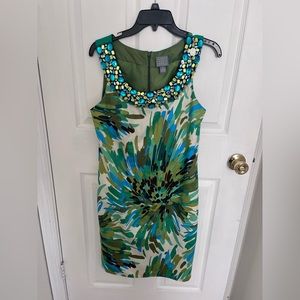 Beautiful multi colored green dress with sewn in jewels